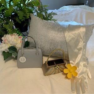 This unique bags are business card holders. The yellow hair clip flower